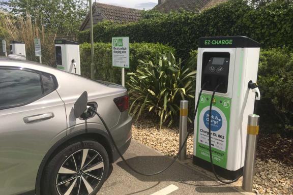 photo of an electric car plugged into a chargepoint