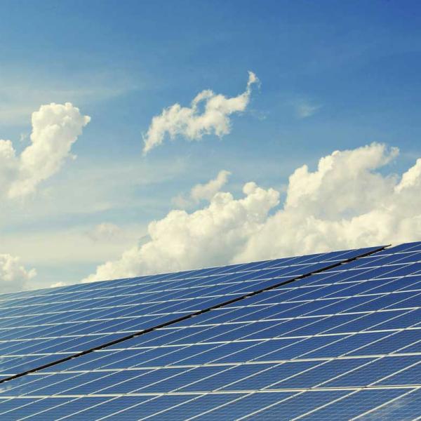 solar panels against a blue sky